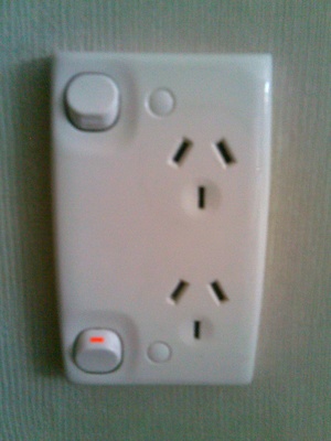 new_zaland_electric_outlet__plug_with_top_plug_off_and_bottom_plug_on_400