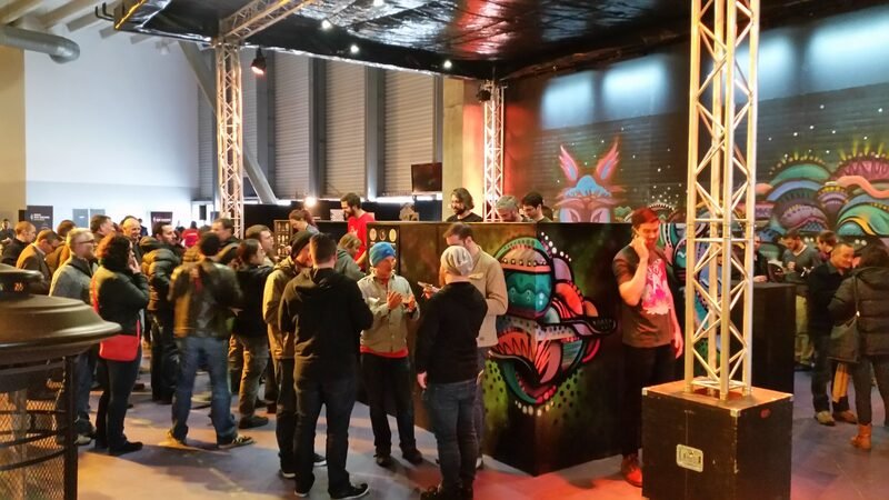 Garage Project stall at Beervana Wellington with crowd and colourful mural