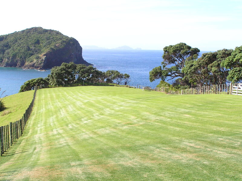 Tutukaka coastline with rocky headlands and blue ocean Northland