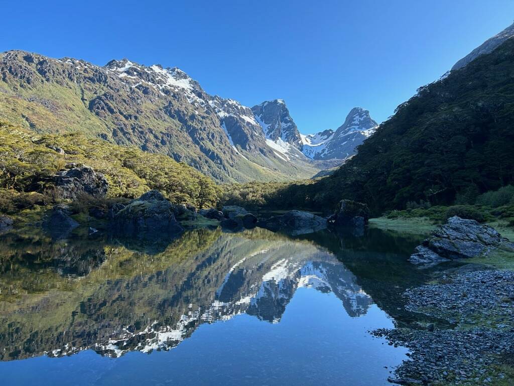 Looking down on the Routeburn Flats from above showing braided river through the valley